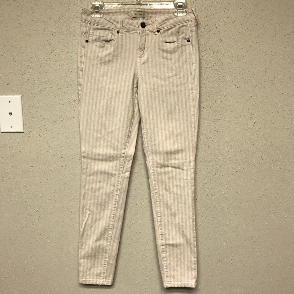 Pink and white vertical striped jeans